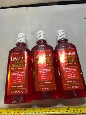 3 18 fl oz bottles of cinnamon mouthwash