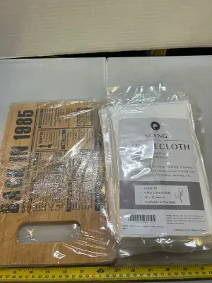 3 packs of cheesecloth and 1985 cutting board