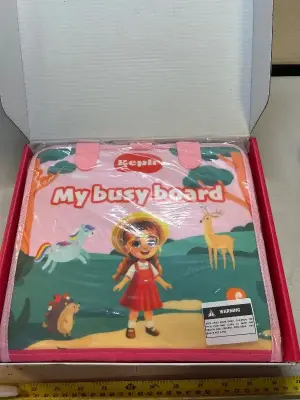 toddler busy board with many activities