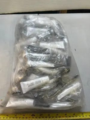 A lot of single use razors and shaving cream