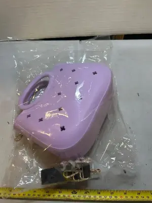 small purse with chain and charms