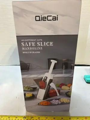 40+ different cuts, safe sliced mandolin with built-in blades