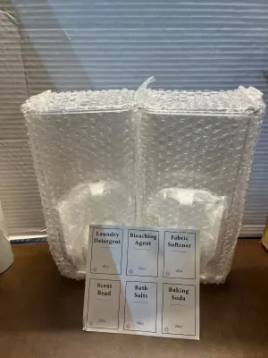 2 pack laundry detergent dispensers with labels