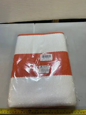 Orange and white striped entryway rug