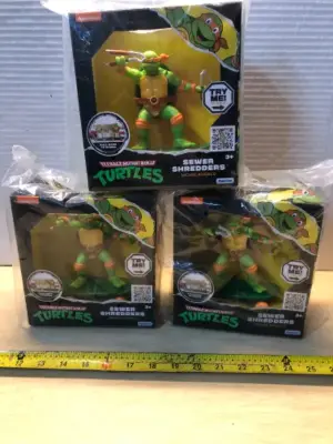 3 boxes teenage mutant ninja turtles action figures