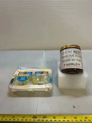 candle and four pack of Febreze plug