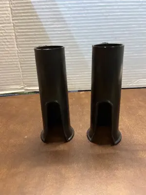 black plastic mouthpiece caps