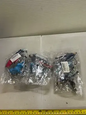 three packs of K-pop demon hunter figurines