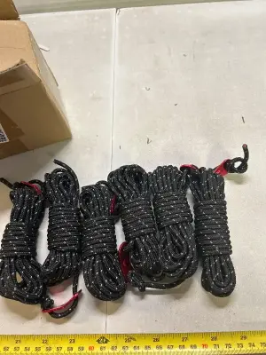 six bundles of cord with adjusters