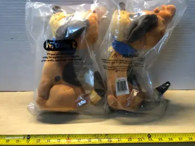 2 plush Dilly Dog