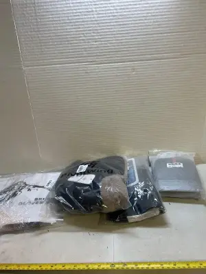 ski gloves, hat, drybag, and pet hair removal