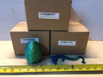 3 boxes 3D printed dragons and eggs 4 per box