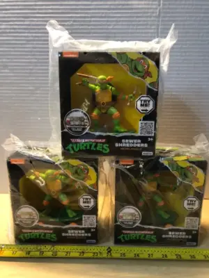 3 boxes teenage mutant ninja turtles action figures
