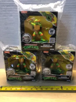 3 boxes teenage mutant ninja turtles action figures