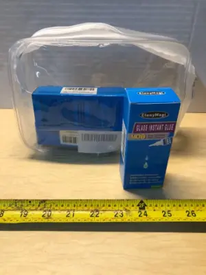 Clear zipped bag and 4 boxes glass instant glue