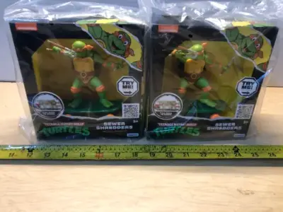 2 boxes teenage mutant ninja turtles action figures