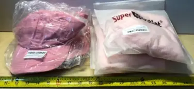 4 pink hats and 3 pink ski masks