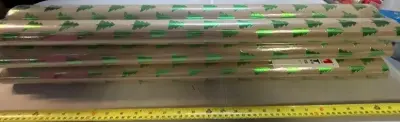 six rolls of Christmas wrapping paper
