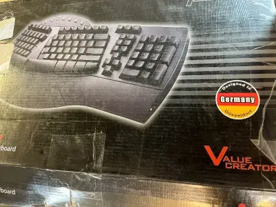 ergonomic split black USB keyboard