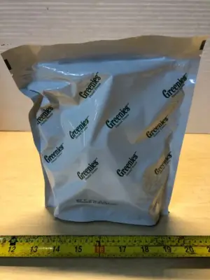 Package of greenies dental treats for dogs exp:12/25/29