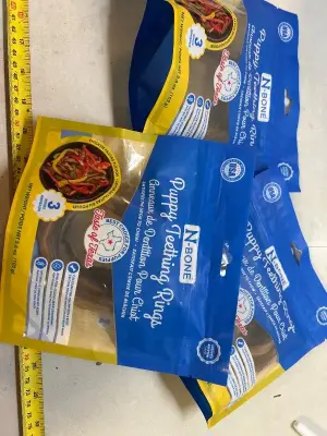 three packs of puppy teething rings
