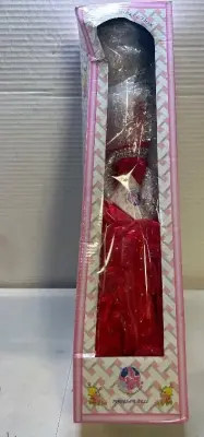 porcelain doll brown, curly bouncy hair