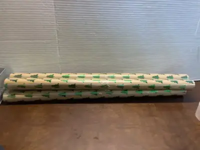 4 rolls of christmas wrapping paper
