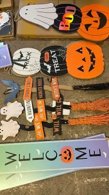 lot of halloween decorations signs