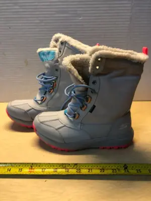 Sketchers waterproof boots size 7.5
