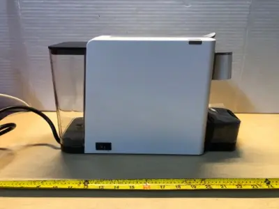Caprista espresso capsule coffee machine (comes on)