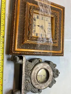 2 decorative clocks