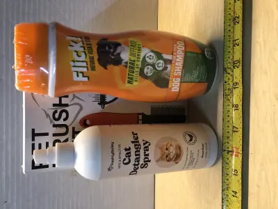 16oz cat detangler spray, 22oz dog shampoo, pet brush set