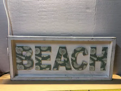 Wooden beach sign