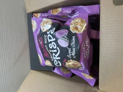 two boxes of sweet Maui onion rice crisps past date