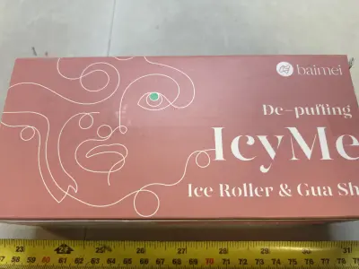 unopened ice, roller, and gua sha