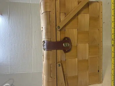large basket with handles and latch