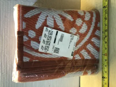 Unknown size outdoor area rug