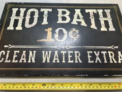 wooden bathroom sign