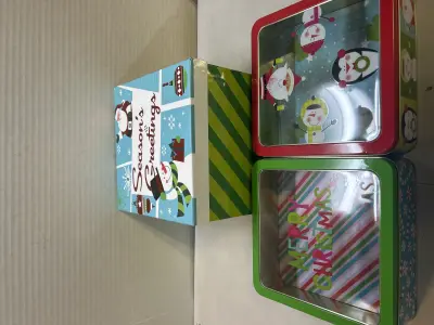 Christmas box and two cookie tins