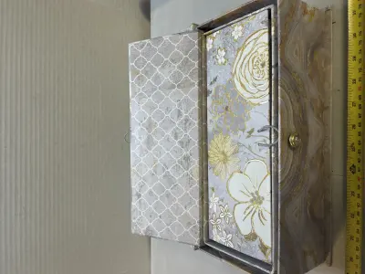 set of three decorative floral boxes