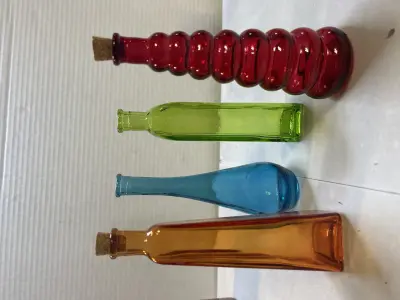 set a four decorative bottles two missing corks