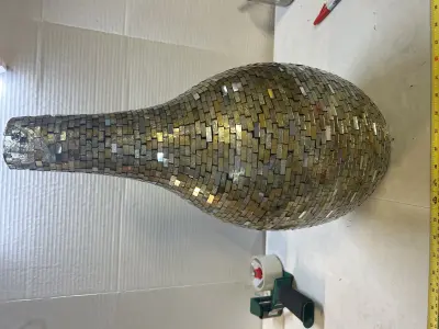 large vase missing some pieces