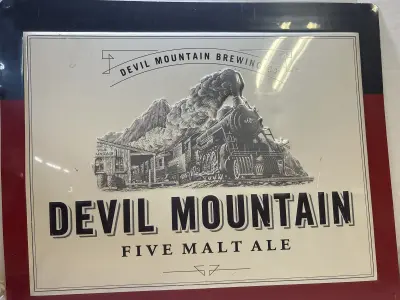 Devil Mountain brewing co metal sign