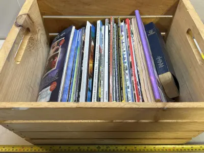 wooden crate of magazines