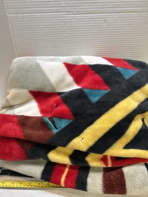 aztec pattern blanket small rips