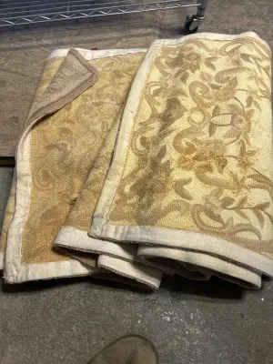 2 uknown size rugs