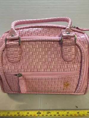 travel makeup bag, small glue stain