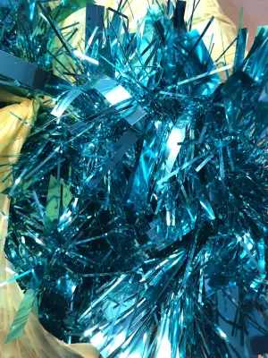 Big bag of teal tinsel