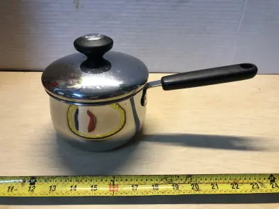 1.5qt stainless steel pot with lid used as is