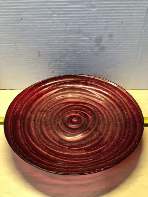 Round red glass accent table piece